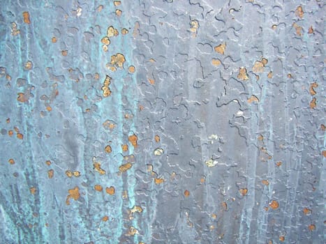Paint chipped keel of a sailboat.