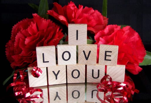 The word Joy reflected in a mirror.