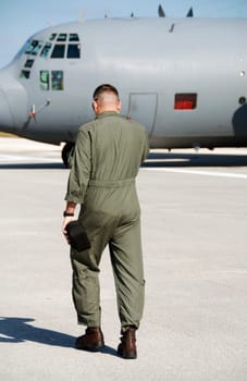 Airforce pilot on his way to fly a mission