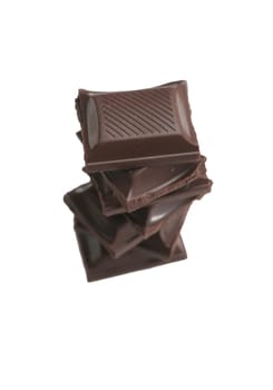 It is a lot of segments of chocolate on a white background