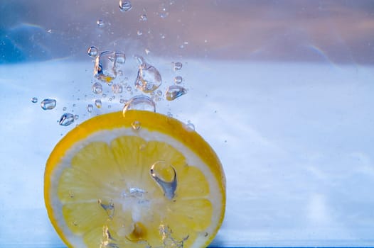 Slice of lemon splashing
