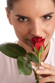 Scent of the red rose: young woman with the red rose
