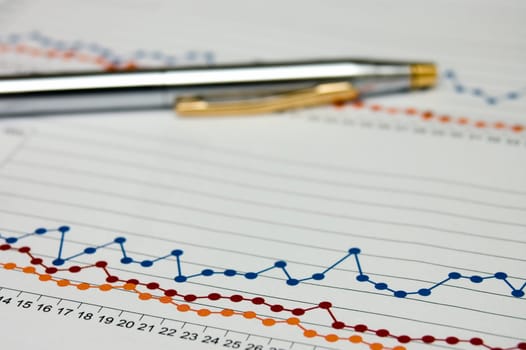 business chart with penn on the background