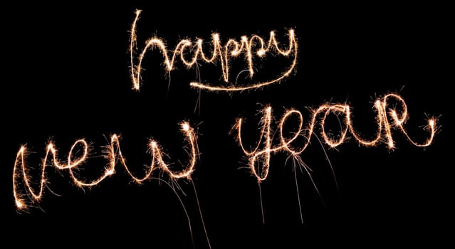 happy new year written in sparklers