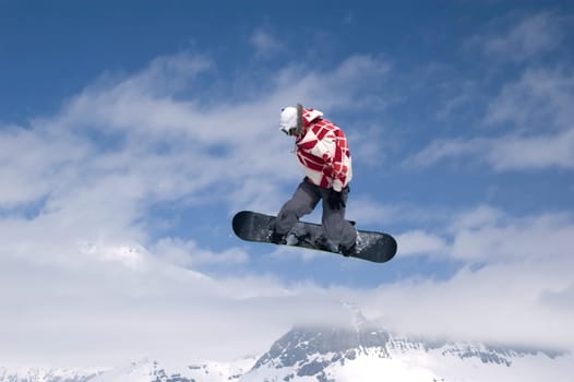 snowboarder jumping high in the air