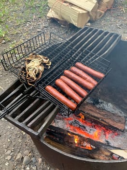 Hotdogs on a campfire while camping