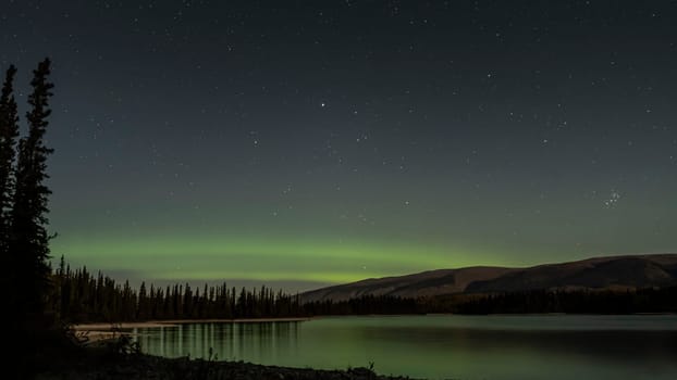 Northern Light Display and the Pleiades over Lake Boya