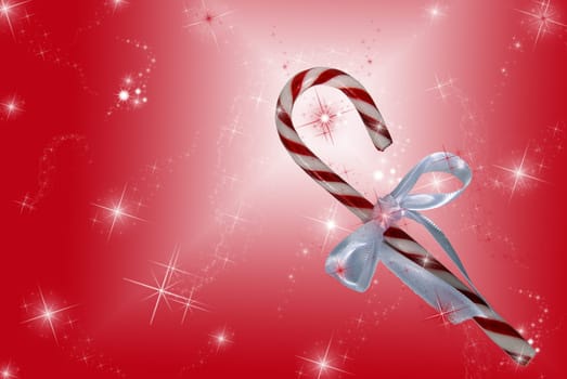Candy cane on sparkling festive background.