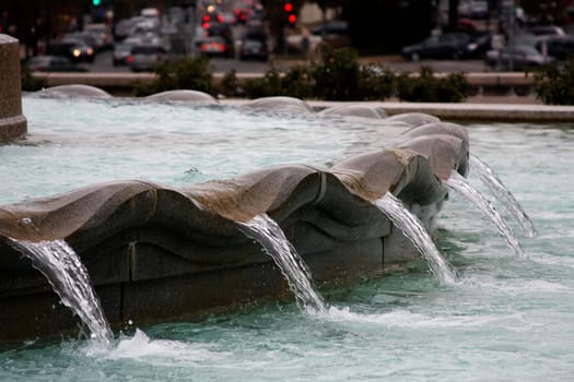 Fountain and a busy street