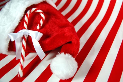 Candy cane on santa's hat.
