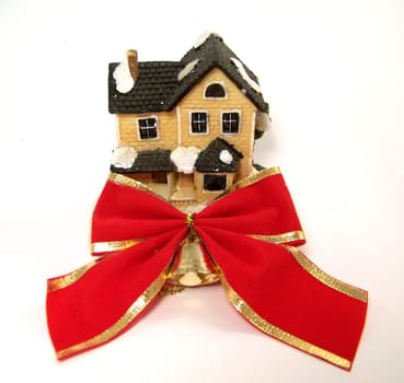 Winter toy-house with red bow