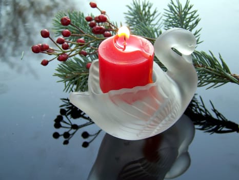 Swan-shaped Candle Holder with red candle and fir-tree branch