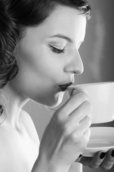 glamorous girl having a cup of coffee