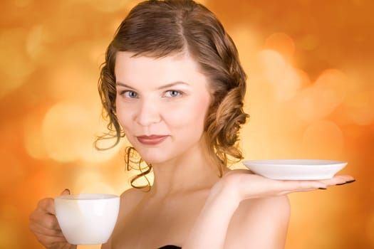 glamorous girl having a cup of coffee