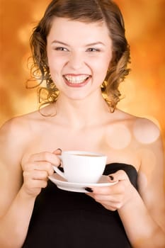 glamorous girl having a cup of coffee
