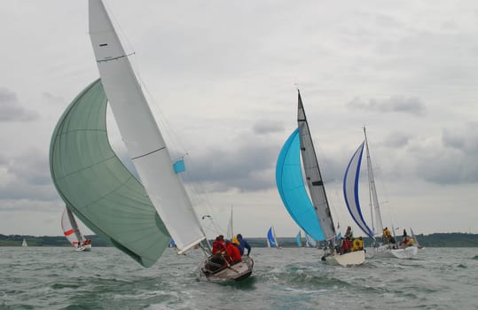 Yachts racing on a stormy day