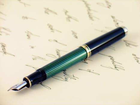 A fountain pen and top
