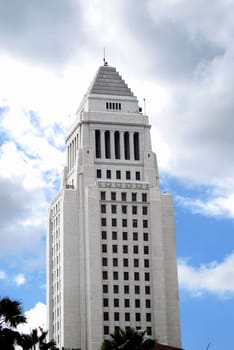 Skies are clearing up as sun shines down on city hall in Los Angeles, California.