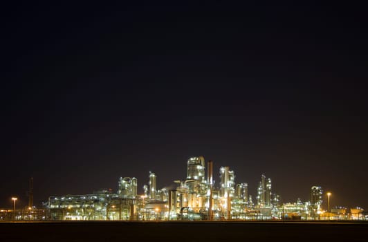 Refinery at night in the Port of Rotterdam, Europoort, Holland