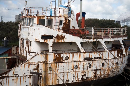 Abandoned ship in the harbor of IJmuiden, the Netherlands