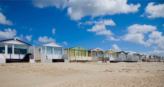 Beachs huts in a row by IJmuiden, the Netherlands