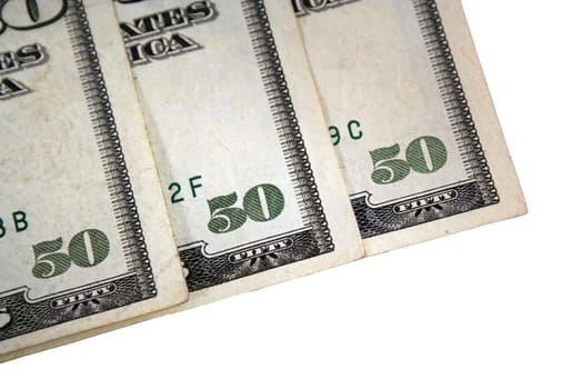 The corner of three US fifty dollar bills