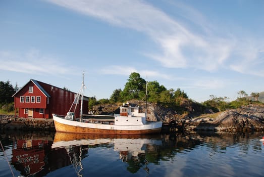 Old norwegian fishing boat now used for tourists.