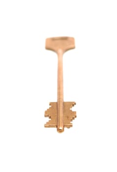 The gold key lays on a white background
