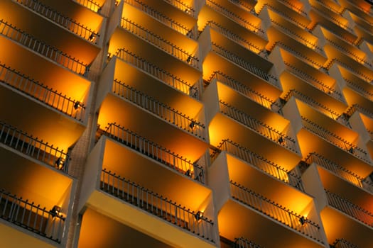 Balcony's lit in the twilight