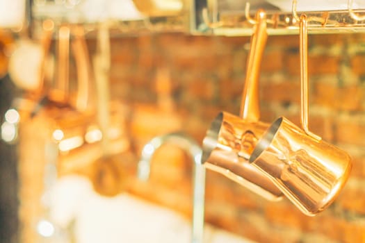 Vintage kitchen utensils on the wall above the sink. retro kitchenware retro kitchen