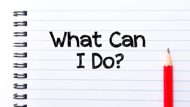 What Can I do Text written on notebook page, red pencil on the right. Motivational Concept image