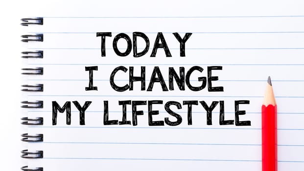 Today I Change My Lifestyle Text written on notebook page, red pencil on the right. Motivational Concept image