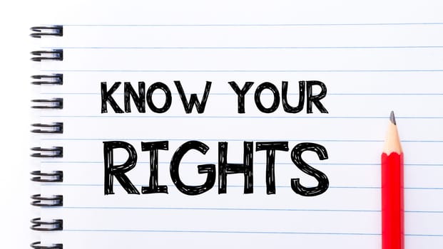 Know Your Rights Text written on notebook page, red pencil on the right. Motivational Concept image
