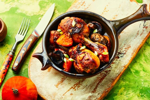 Chicken marinated meat in soy ginger sauce. Chicken legs fried with pumpkin and mushrooms.