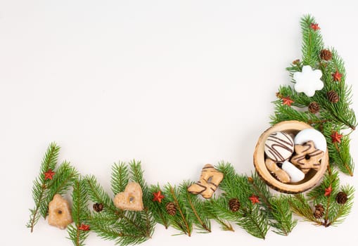 Nurnberg elisen gingerbread mix, traditional german christmas sweets with fir branches and pine cones, holiday background with copy space