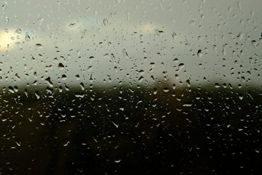 Water drops on the glass - abstract background, Shades of Gray.