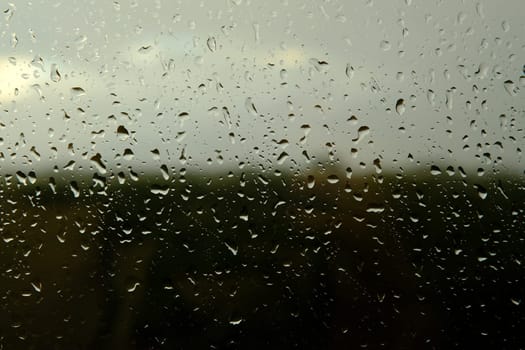 Water drops on the glass - abstract background, Shades of Gray.