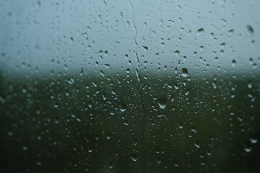 Water drops on the glass - abstract background, Shades of Gray.