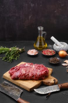 Fresh lamb boneless neck meat on cutting board ready for cooking