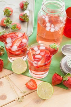 Homemade strawberry bowl with fresh lime