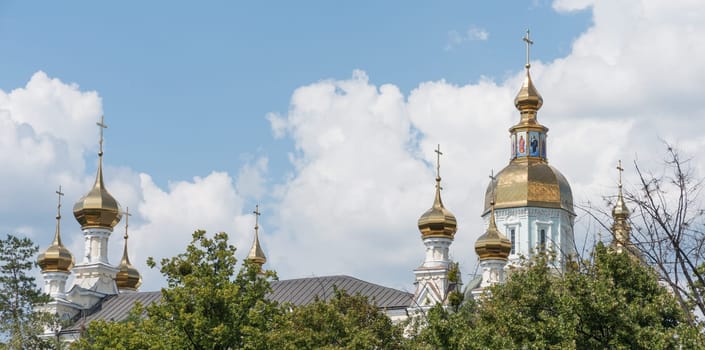 Gold domes of an orthodox church in kharkiv