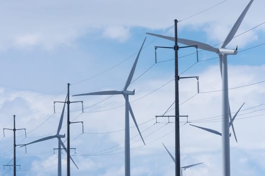 Wind turbines and electricity power pylons and cables