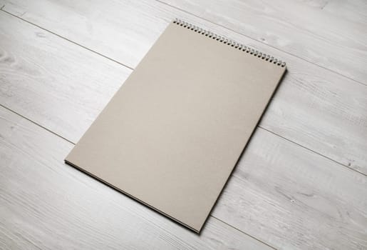 Blank kraft notebook. Mock-up for design presentations and portfolios.