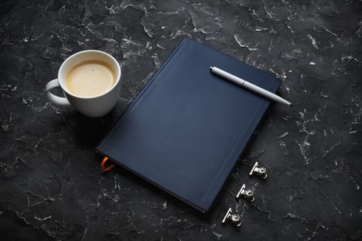 Blank book, coffee cup and pen. Stationery elements. Template for placing your design.