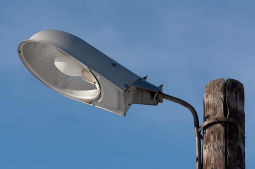 mercury lamp for street lighting on a blue sky background. High quality photo