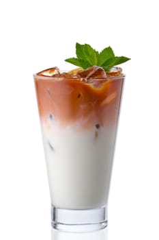 Ice coffee with cream in highball glass isolated on white background