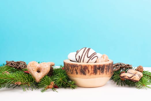 Nurnberg elisen gingerbread mix, traditional german christmas sweets with fir branches and pine cones, holiday background with copy space