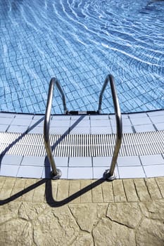 Detail of access to an outdoor swimming pool, sports and holidays