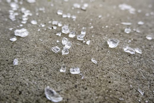 Detail of broken glass in the garbage, danger due to cuts