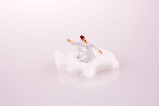 Sufi Derviş on a Cloud on a white background